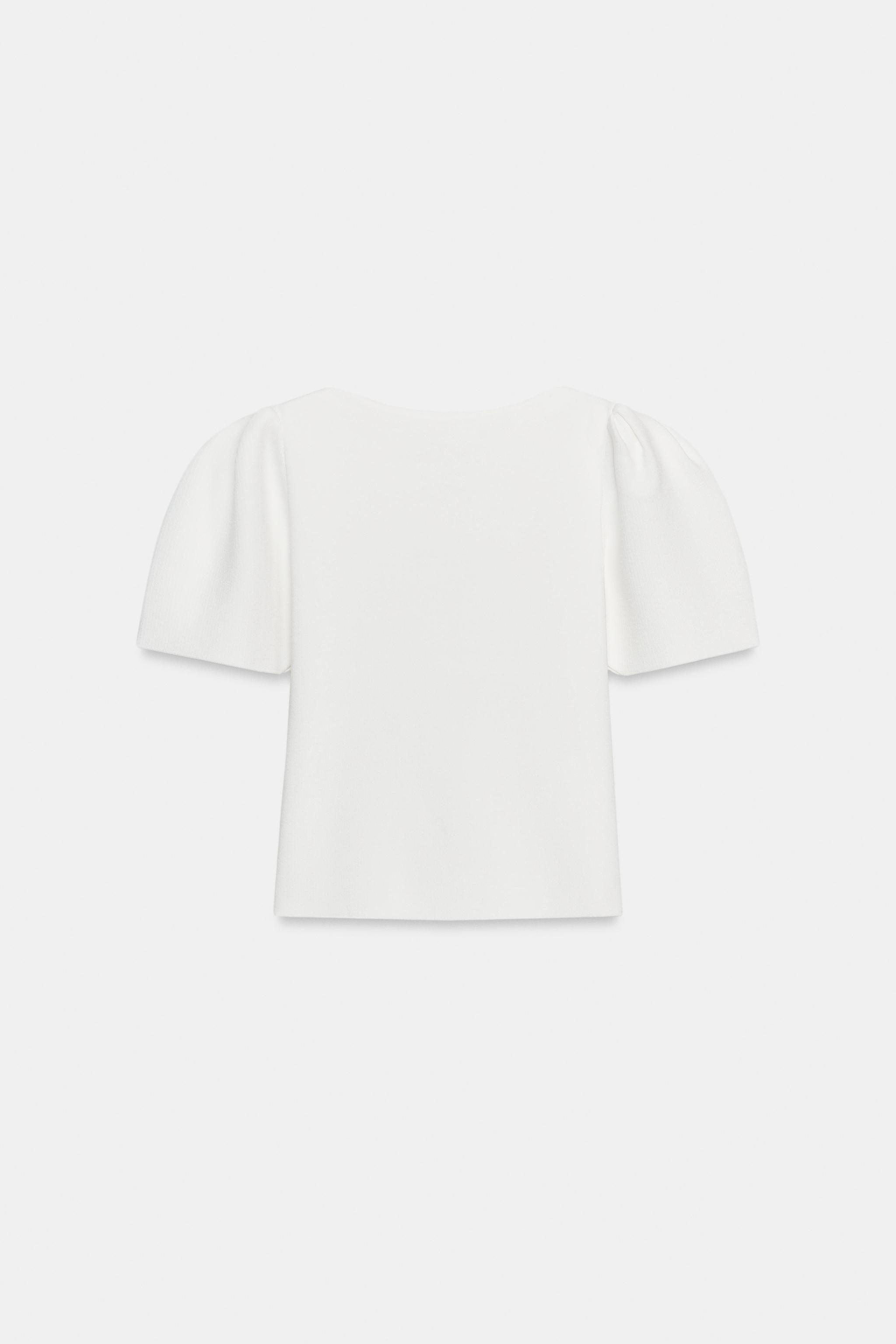 TOP EN MAILLE À MANCHES BOUFFANTES